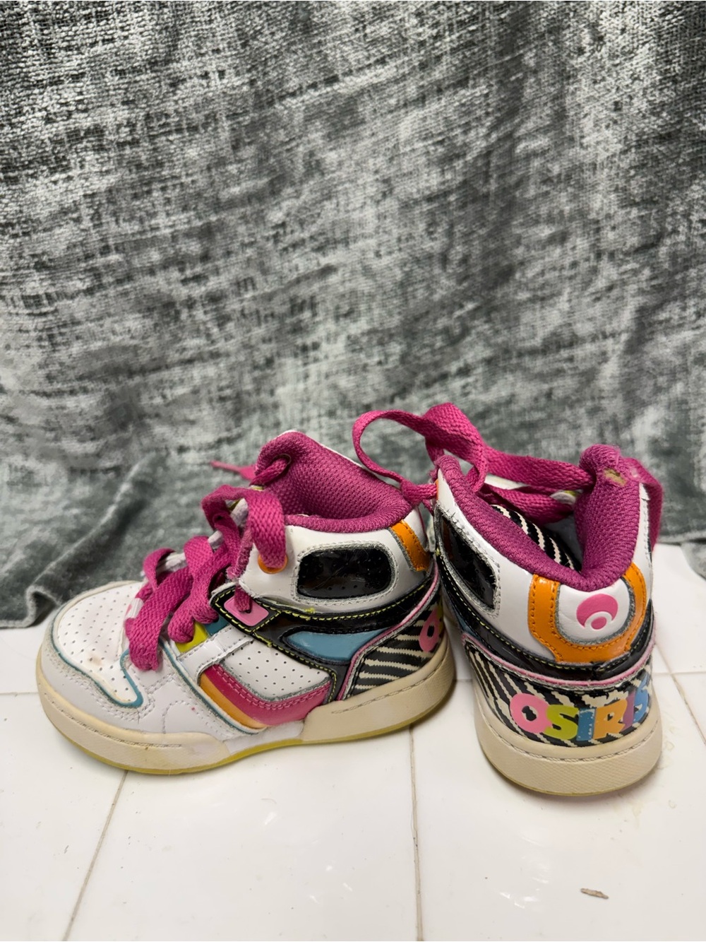 Osiris Kids High-Top Sneakers in White with Pink, Yellow & Blue Accents